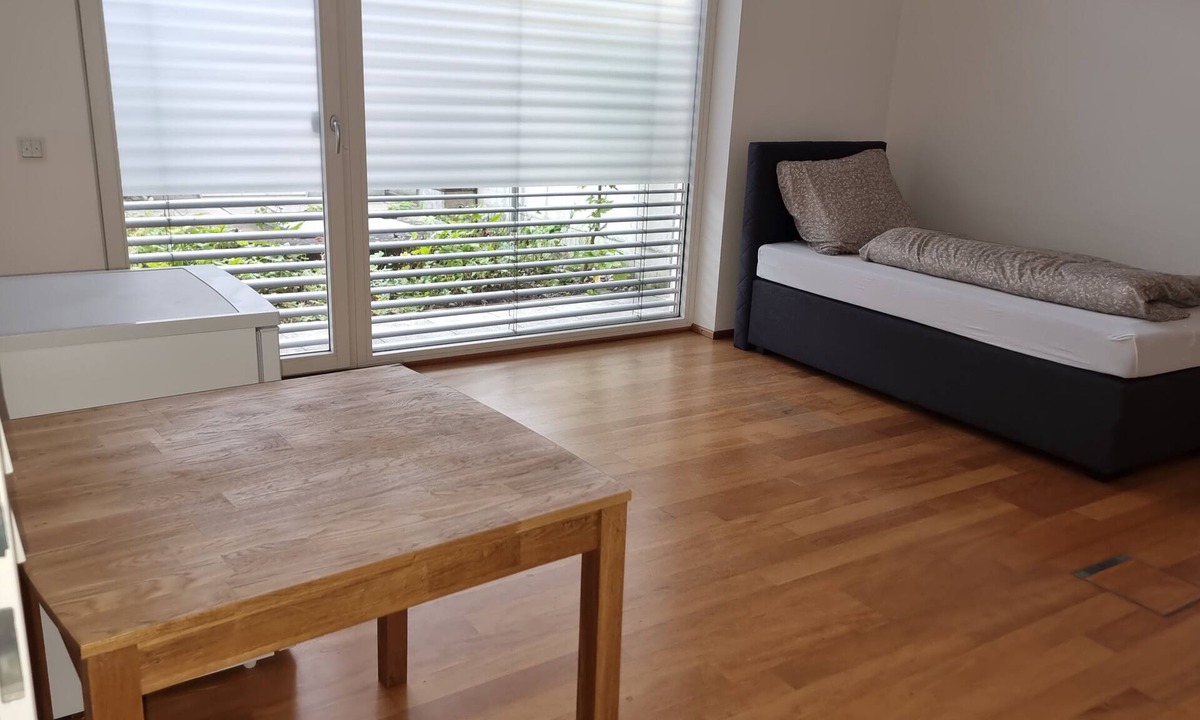 Helpfau-Uttendorf Apartment | Geräu. Ground floor apartment with terrace in the village center with 8 bedrooms. 2 bathrooms and a kitchen