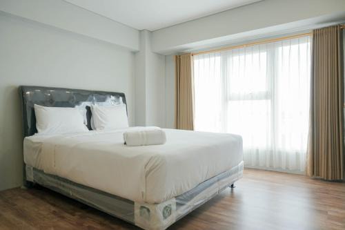 Kebon Jeruk Apartment | Gorgeous 2BR Apartment Maqna Residence By Travelio