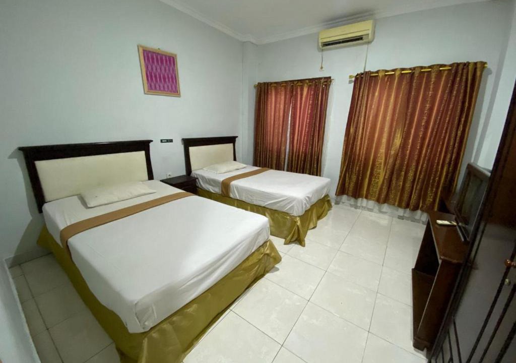 Makassar Hotel | Hotel Magellona Makassar Mitra RedDoorz