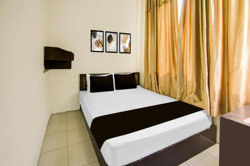 Panakkukang Hotel | Hotel O Makassar near RS Grestelina formerly Wisma Makassar