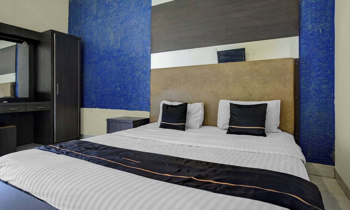 Palembang Hotel | Hotel O near Universitas Widya Dharma