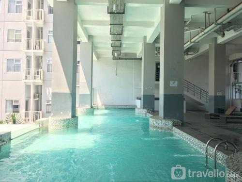 Cileunyi Apartment | Modern and Cozy Studio Room at Easton Park Residence near UNPAD By Travelio