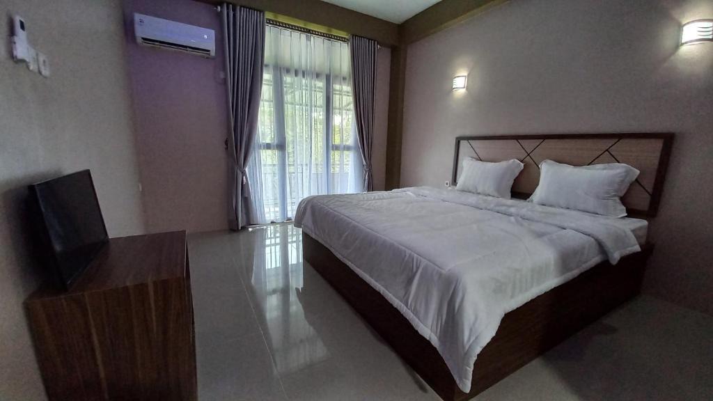 Pekanbaru Hotel | OYO 92562 Dewata Homestay