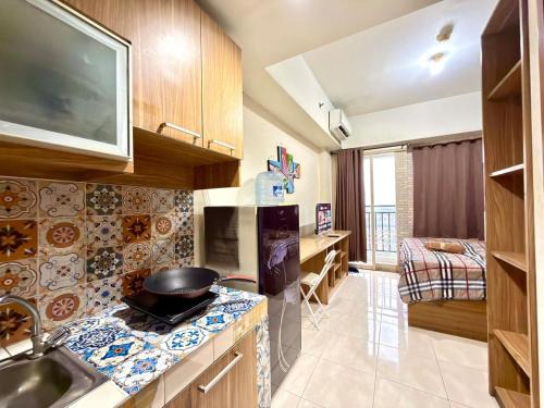 Depok Apartment | Strategic & Cozy Studio Apt at Margonda Depok by Ls