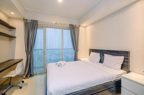 Cikarang Apartment | Warm and Cozy Studio at The Oasis Cikarang Apartment By Travelio