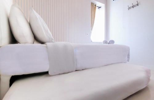 Jatinegara Apartment | 2 BR Bassura City Apartment with Mall Access By Travelio