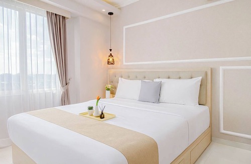 Depok Apartment | 2BR Corner with South and East View at Podomoro Golf View Apartment