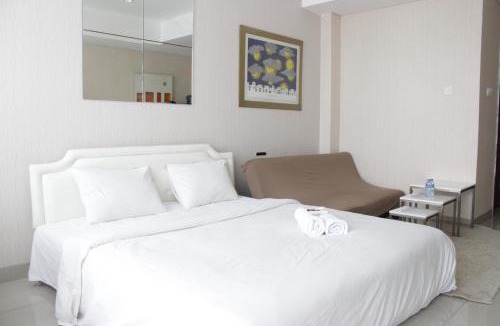 Hegarmanah Apartment | Bright Studio Room at Dago Suites Apartment near ITB By Travelio