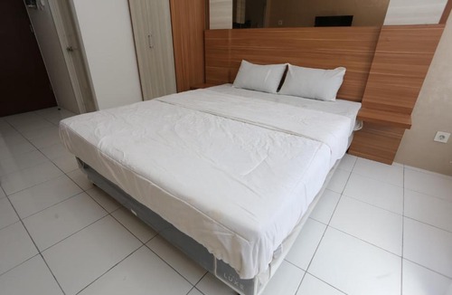 Bekasi Hotel | Capital O Iconic Rooms @ Golden City