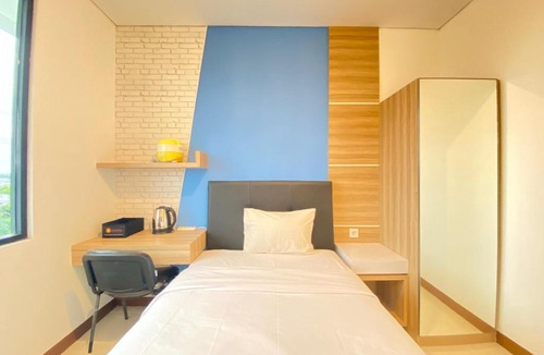 Ciroyom Apartment | Comfortable Studio Semi Apartment at The Lodge Paskal near BINUS University By Travelio