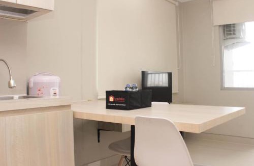 Duren Sawit Apartment | Cozy Studio at Gateway Park LRT City Jatibening Apartment By Travelio
