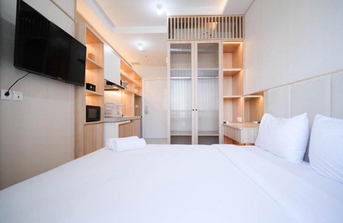 Surabaya Apartment | Cozy Studio Connected to Mall at The Vertu Apartment By Travelio