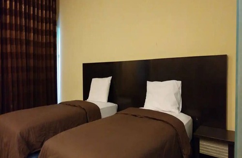 Manado City Centre Hotel | Cozzy Hotel Quint
