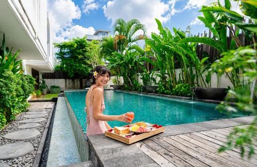 Dewi Sri Hotel | D'Green Nirava Kuta By Reccoma