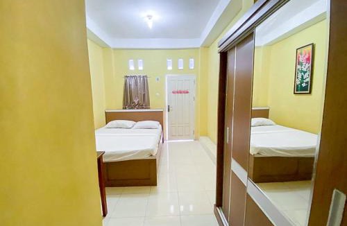 Jambi Hotel | Damigalova Guest House Mitra RedDoorz