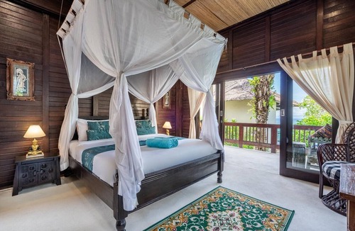 Candi Dasa Apartment | Deluxe Double Room with Balcony and Ocean View | The Village of Angels Resort