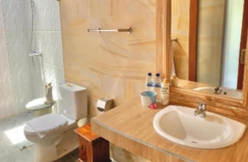 Mambal House | Deluxe Room Puri Uma Dewi room only