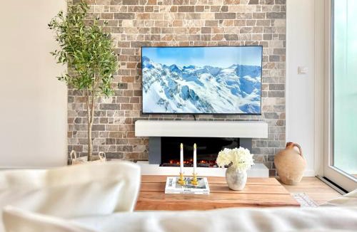 Schwarzach Apartment | FLAIR Apartments Vorarlberg - Stilvolles Wohnen nahe Bodensee & Alpen - Küche, Balkon & Gratis Parkplatz