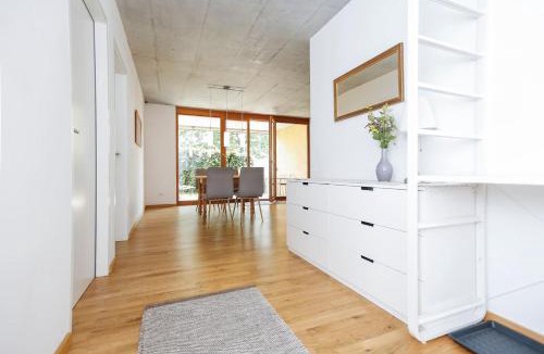 Klaus Apartment | Gartenwohnung in prämierter Wohnanlage Nachhaltige Kühlung über Erdsonde und Fussbodenkühlung