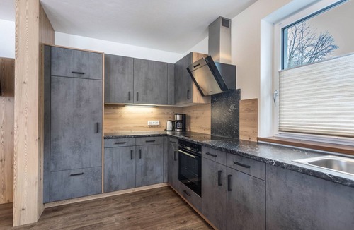 Sankt Johann im Pongau Apartment | Holiday flat 'Apartment Berger' with mountain view, communal garden and WLAN