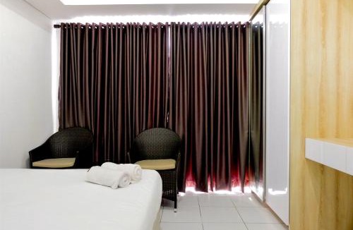 Bumi Serpong Damai Apartment | Homey Studio at Casa De Parco Apartment By Travelio