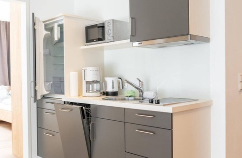Damuels Apartment | Hotel apartment, separate toilet and bathroom/shower - Alpin Resort Damüls