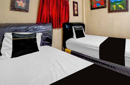 Surabaya Hotel | Hotel O near City of Tomorrow Mall formerly Vandhela Homestay