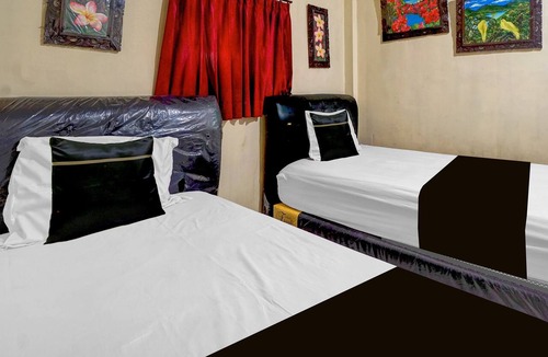 Surabaya Hotel | Hotel O near City of Tomorrow Mall formerly Vandhela Homestay