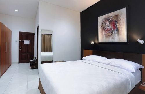 Gondangdia Hotel | Jambuluwuk Heritage Menteng Suites