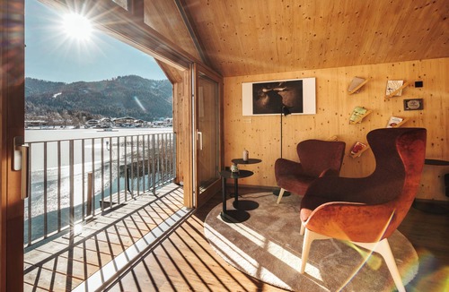 Gatschach Ski Chalet | Modern wooden chalet directly on Lake Weissensee in Carinthia incl. beach and SEE-Spa!