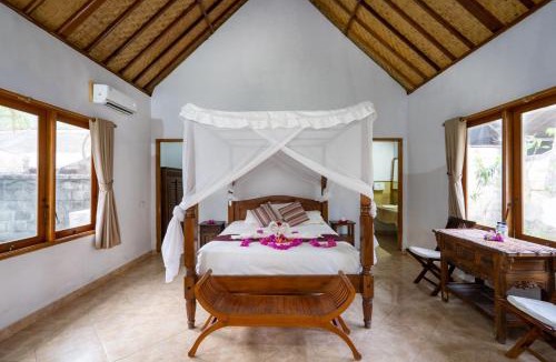 Mushroom Bay Hotel | Mushroom Beach Bungalows