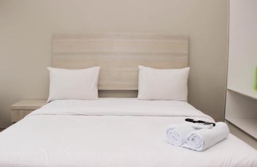 Duren Sawit Apartment | Nice Studio at Gateway Park LRT City Jatibening Apartment By Travelio