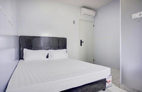 Perbaugan Hotel | OYO 94903 Akasia Guesthouse