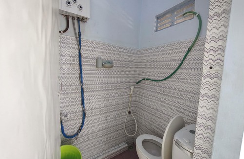 Dinoyo Hotel | OYO 95170 Purnama Baru Syariah