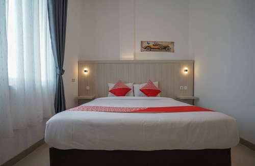 Sukarami Hotel | OYO Life 1299 Balcony Orange Homestay