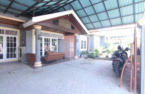 Padang House | Penginapan Bunga Sonsang Padang Syariah