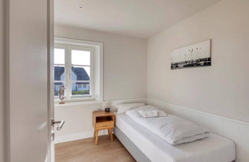 Rantum Apartment | Rantum Dorf - Ferienappartments im Reetdachhaus 3 & 4