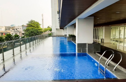 Tangerang Apartment | Restful And Serene Studio Room At Apartment Trimezia - Beverly 90210