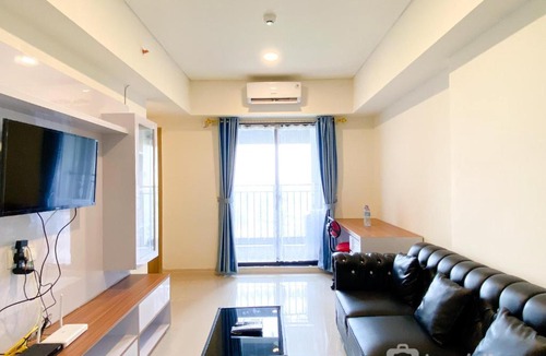 Cikarang Apartment | Spacious and Comfy 2BR with Extra Room at Meikarta Apartment By Travelio