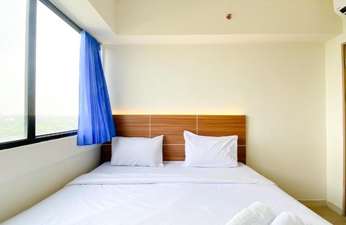 Cikarang Apartment | Spacious and Comfy 2BR with Extra Room at Meikarta Apartment By Travelio