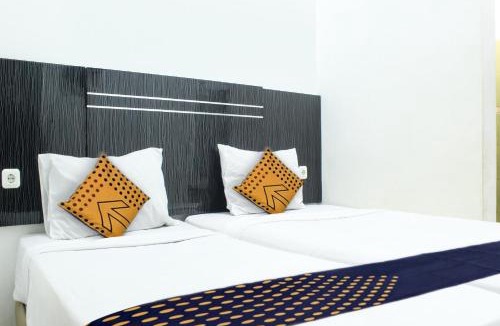 Kupang Hotel | SPOT ON 3605 Clarichie Guest House
