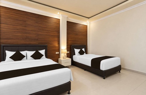 Sampalan Hotel | Townhouse Oak Hotel Grand Puri