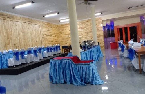Ngaglik House | Triple Room with AC at Mutiara Batu