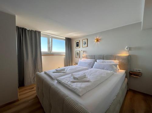Appartement WOLKE7 byTILLY - Familienfreundliches Alpenzuhause mit Hallenbad, Balkon & Panoramablick hoch oben auf der Gerlitzen in Treffen