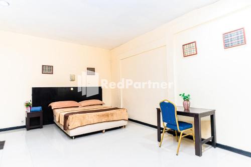 Cherry Pink Hotel Medan Mitra RedDoorz in Medan