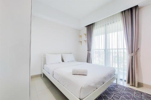 Comfort 1BR without Living Room Bintaro Embarcadero Apartment By Travelio in Tangerang