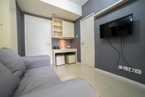 Contemporary 1BR Near Cihampelas at Parahyangan Residence Apartment By Travelio in Bandung