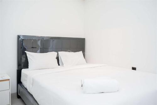 Enjoy Living 2BR Apartment at Carstensz Residence By Travelio in Kampung Sawah