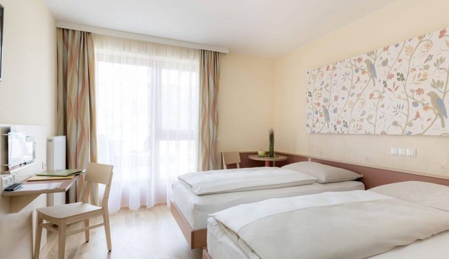 Four-bed room, shower, WC, superior, half board - JUFA Hotel Stubenbergsee in Buchberg bei Herberstein