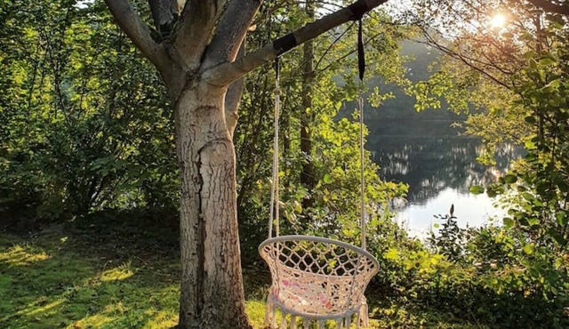 Idyllic lakeside home with 85 m² of living space and an optional hot tub in Bockhorn